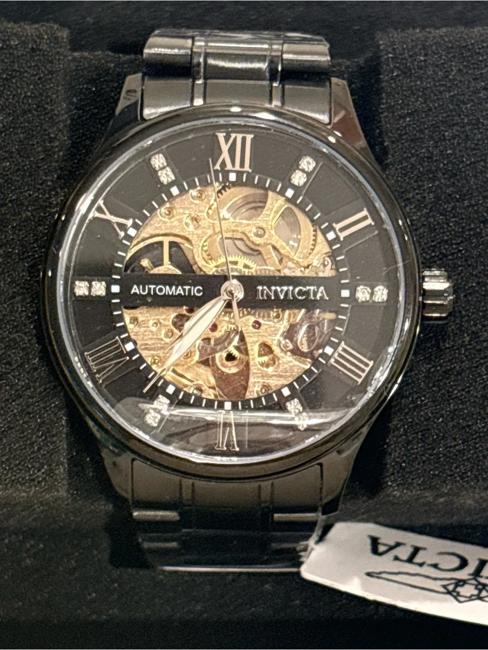 Invicta Men’s Black and Gold Skeleton Mechanical Watch